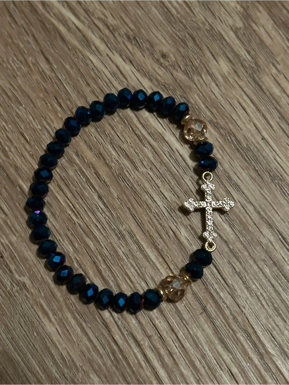 Gold Cross Bead Stretch Bracelet with Dark Blue Faceted Beads